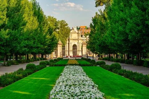 View of the Puerta de Alcala from inside the Retiro Park, a World Heritage .. Stock Photos