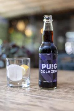 View on Puig cola zero bottle and glass, produced by Begudes Puig, a Mallor.. Stock Photos