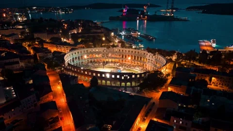 View of Pula Arena illuminated at night in Pula, Croatia. Stock Footage 339916430