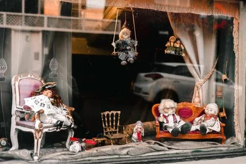View of a puppet store window, full of old, dusty toys.iceland reykyavik Stock Photos