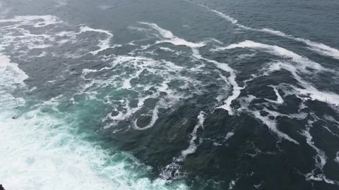 View from a quadcopter of waves in the ocean in northern Spain Stock Footage 282574596