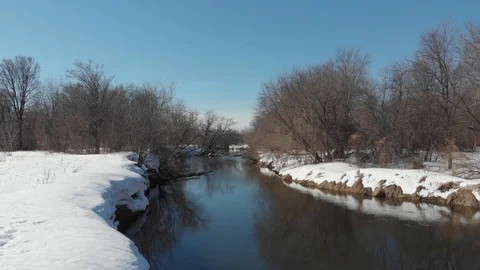View from the quadrocopter on the river in spring Stock Footage 120936498