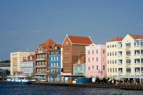 A view from Queen Emma floating bridge on historic central Willemstad. Stock Photos