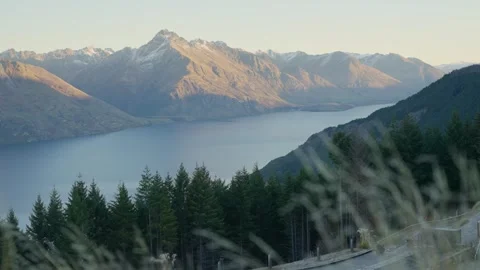 View of Queenstown mountain range The Remarkables seen from hill during autumn Stock Footage 289417306