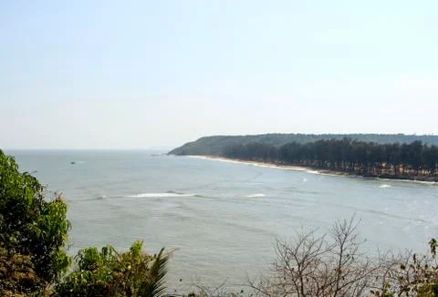 View Querim beach from the hill on the opposite bank Stock Photos