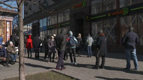 View of a queue in front of a grocery in Kiev Stock Footage 175266003
