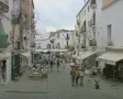 View of quiet street with people walking down it SD Footage