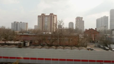 View of rail way form window of moving train. Transport of Moscow. Autumn day Stock Footage 109571521