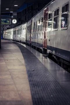 View on a railroad station train platform in Antwerp central railway station Stock Photos