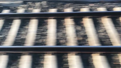 View on railroad track from the window of fast train. Bullet train rides on t Stock Footage 133652114