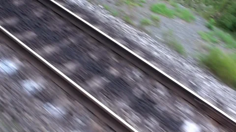 View of the rails with a moving train. Stock Footage 34992482