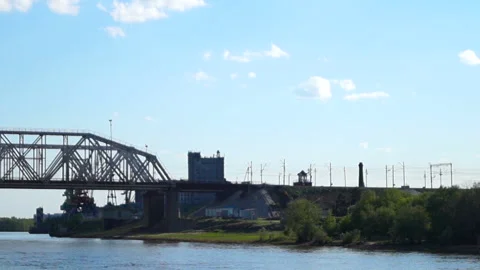 View of the railway bridge from the river Stock Footage 113534859