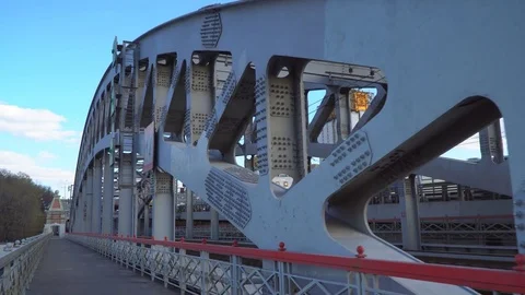 View of the railway bridge with train passing through it Stock Footage 75359910