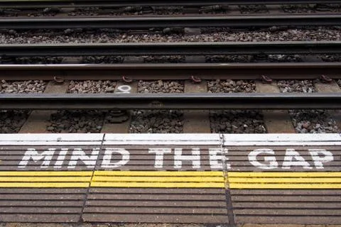 A view of the railway. Mind the gap. Stock Photos