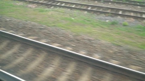 View of railway track through train window Stock Footage
