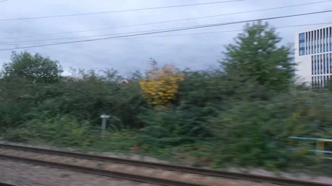 View from railway train window including the Olympic Park. London Stock Footage 289847303