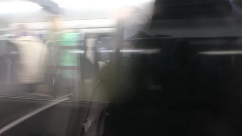 View from railway train window of passing carriages. London Stock Footage 289847242