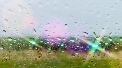 View Of Rain Looking Out Of A Moving Vehicle Window Stock Footage 252040772
