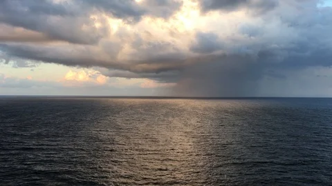 View of rainfall in the distance from North Mona Vale Headland Reserve Stock Footage