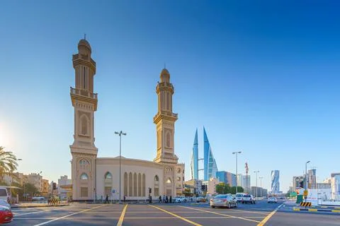 View of Ras Rumman Mosque, with the World trade center if Bahrain Stock Photos