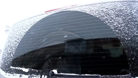 View of the rear snow-covered window of the car. Stock Footage 168964200