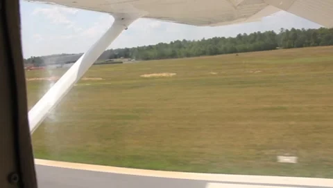 View From Rear Window Of Cesna 172 Landing Stock Footage 8529258