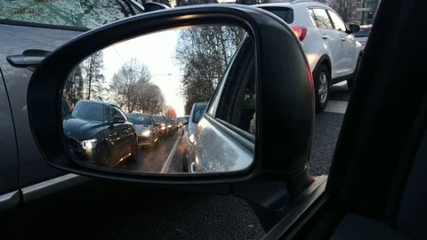 The view from the rearview mirror is impressive: the tail of the car is very Stock Footage 101895402