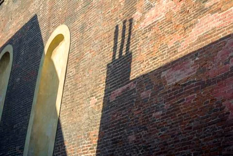 View of the red brick wall on which the shadow, Prague, Czech Republic Foto stock