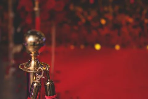 View of red carpet between ropes and golden barriers on a luxury party entran Fotos de archivo