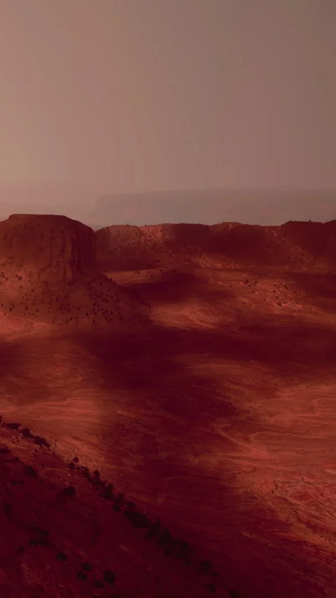 View of red landscape at sunset in a desert area with mountains nearby Stock Footage 342343786