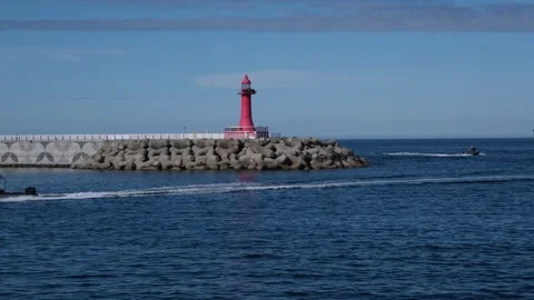 View of the Red Lighthouse from Yangyang Beach in Sokcho, South Korea Video stock 342109178