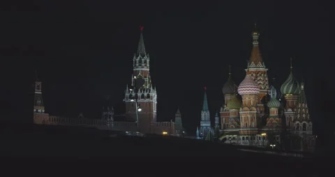View of Red Square in Moscow at night. Silhouette of a man with a backpack runs Stock Footage 131059979