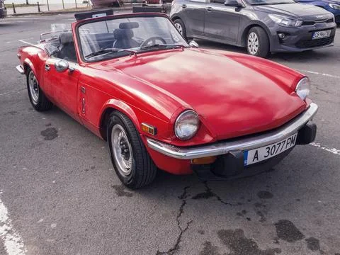 View of red Triumph Spitfire MK4 parked in the street in old town of Nessebar Stock-Fotos