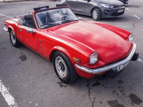 View of red Triumph Spitfire MK4 parked in the street in old town of Nessebar Stock-Fotos