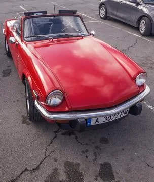 View of red Triumph Spitfire MK4 parked in the street in old town of Nessebar Stock Photos