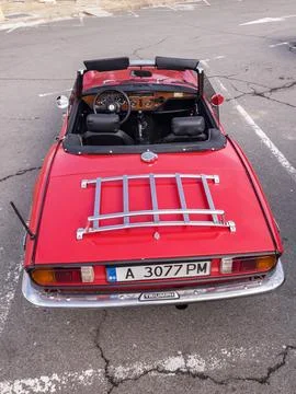 View of red Triumph Spitfire MK4 parked in the street in old town of Nessebar Stock-Fotos