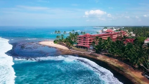 View of the reefs Sri lanka beach palms Stock Footage 107859611