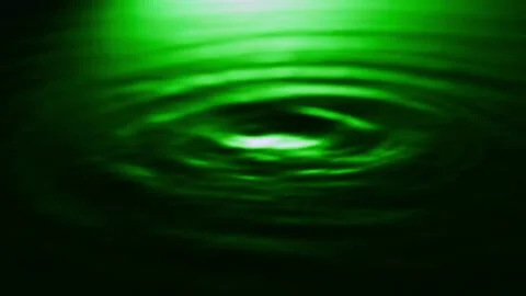 View on reflection swirl pure flow drink green soda.Slow motion speed ramp video Stock Footage 255196152