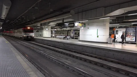 View of regional train arrive in Barcelona underground station people traveler Stock Footage 81979627