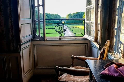 View of the regular Park through a window with bars. Summer Stock Photos