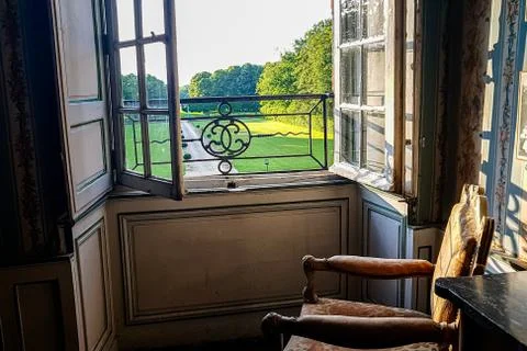 View of the regular Park through a window with bars. Summer Stock Photos