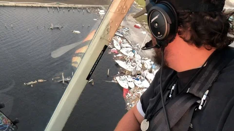 View of rescue pilot flying over Florida after hurricane Michael Stock Footage 98936809