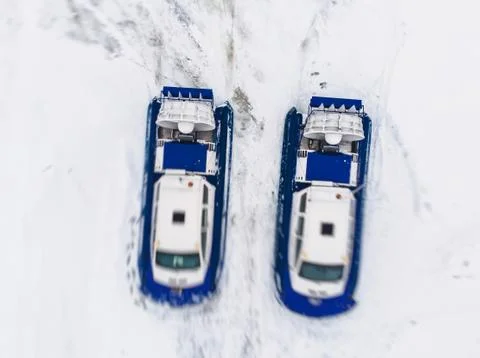 View of rescue team Hovercraft. hover craft transport boat crossing frozen ri Stock Photos