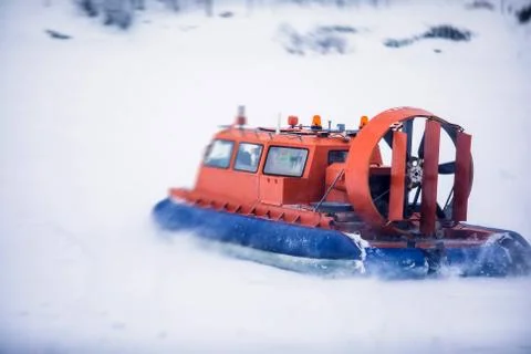 View of rescue team Hovercraft. hover craft transport boat crossing frozen ri Fotos de archivo