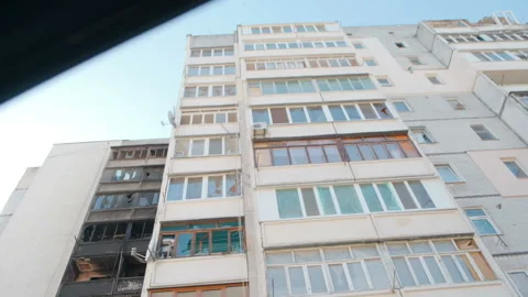 View of a residential building with broken windows. Kharkiv, Ukraine Stock Footage 197607206