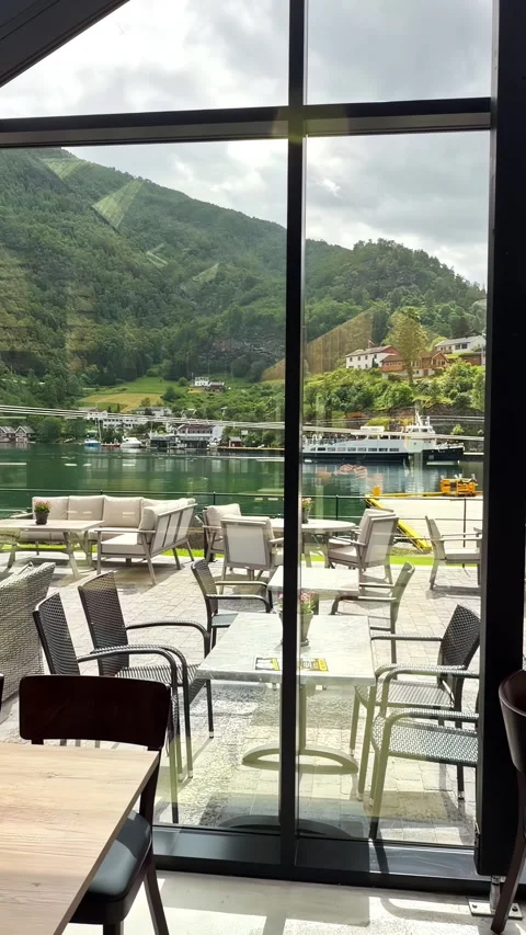 View of a restaurant interior overlooking the harbor in Flam, Norway. Stock-Footage 343878789