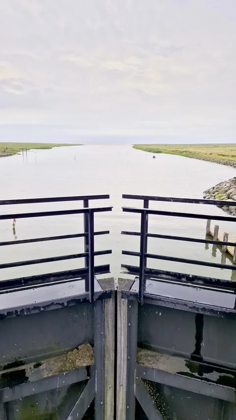 View from Ribe Lock Gate toward the Wadden Sea Tidal Flats, Denmark Stock Footage 333897013