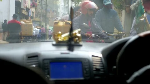 View from riding inside a car travelling through narrow Dhaka roads Stock Footage 246292753