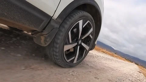 View of the right front wheel of the SUV car. Close-up car Stock Footage 230610131