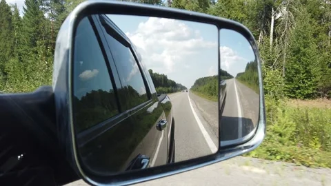 View from the right rear-view mirror of the car Stock Footage 157426712